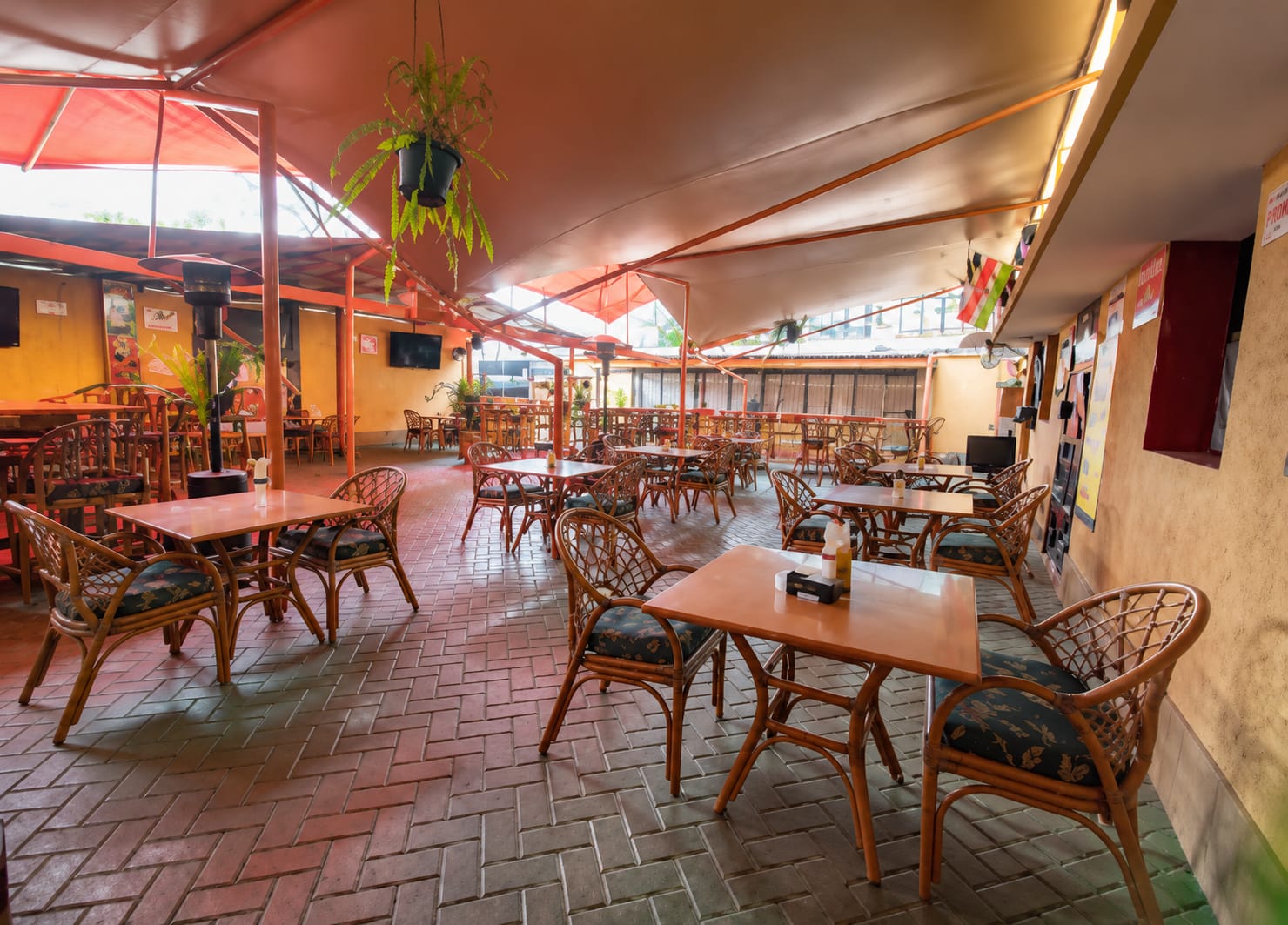 Covered rooftop restaurant seating area